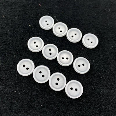 Buton rotund din plastic cu 2 găuri